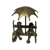 Brass Decor Sitting on bench frogs with umbrella