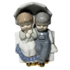 Children Hiding Under Umbrella Figurine